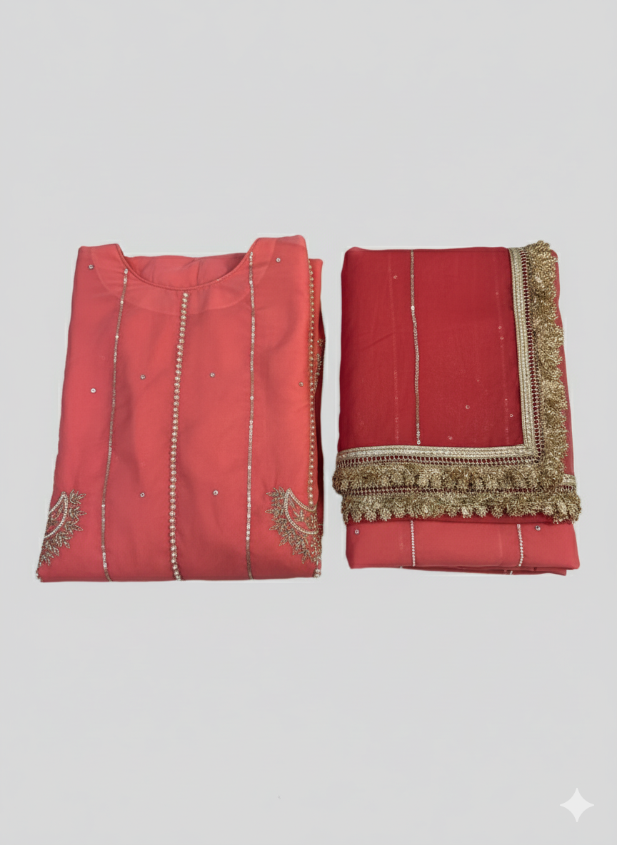 Beautiful hand-embroidered coral outfit with gold and silver embellishments